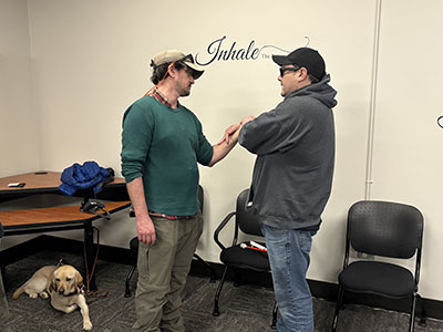 2 students practicing self defense techniques