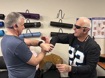 2 students practicing self defense techniques
